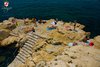 Bagnanti sulla spiaggia Monte a Rovigno