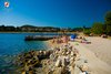 Spiaggia ghiaiosa e rocciosa a Porton Biondi